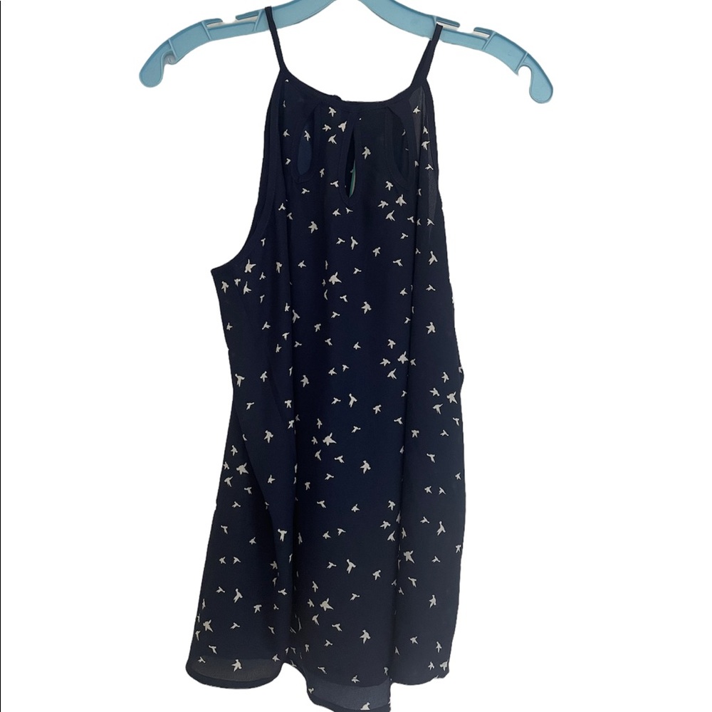 Brand new royal blue halter top with stylish cut outs at the top
